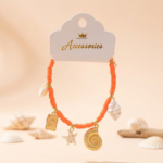 Kadın Turuncu Fimo Boncuklu Gold Tarot ve Deniz Kabuğu Charm Bileklik
